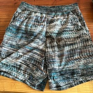 7 inch Inseam Lululemon pacebreaker Shorts, size small in static blue/white.